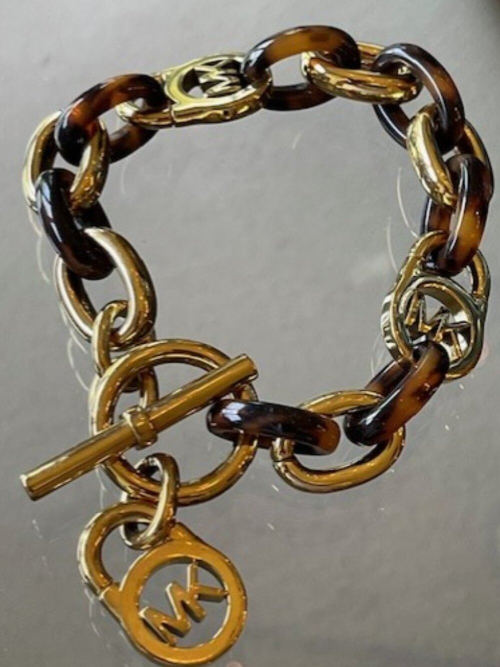 Michael Kors gold and tortoiseshell bracelet